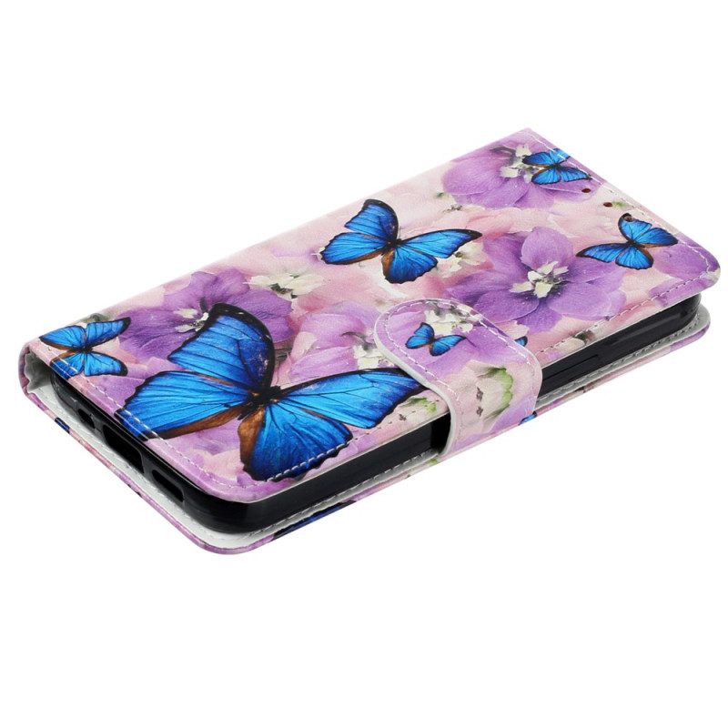 Custodia in pelle iPhone 15 Plus Piccole Farfalle Blu Con Cinturino