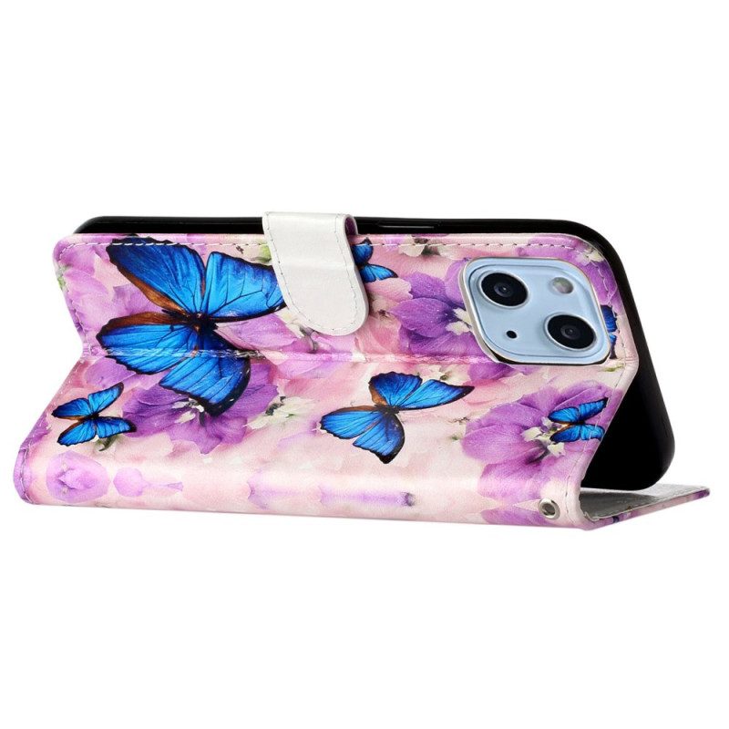 Custodia in pelle iPhone 15 Plus Piccole Farfalle Blu Con Cinturino