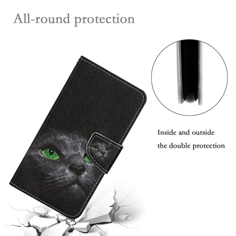 Custodia in pelle Samsung Galaxy A13 Gatto Dagli Occhi Verdi Con Cinturino