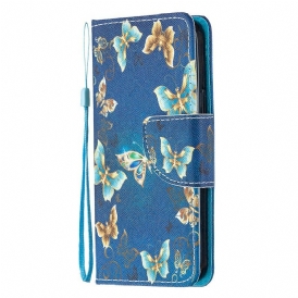 Custodia in pelle iPhone 12 Mini Farfalle Blu E Fiori Con Cinturino