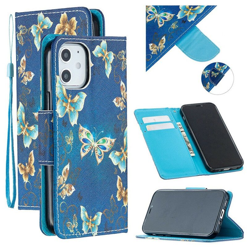 Custodia in pelle iPhone 12 Mini Farfalle Blu E Fiori Con Cinturino