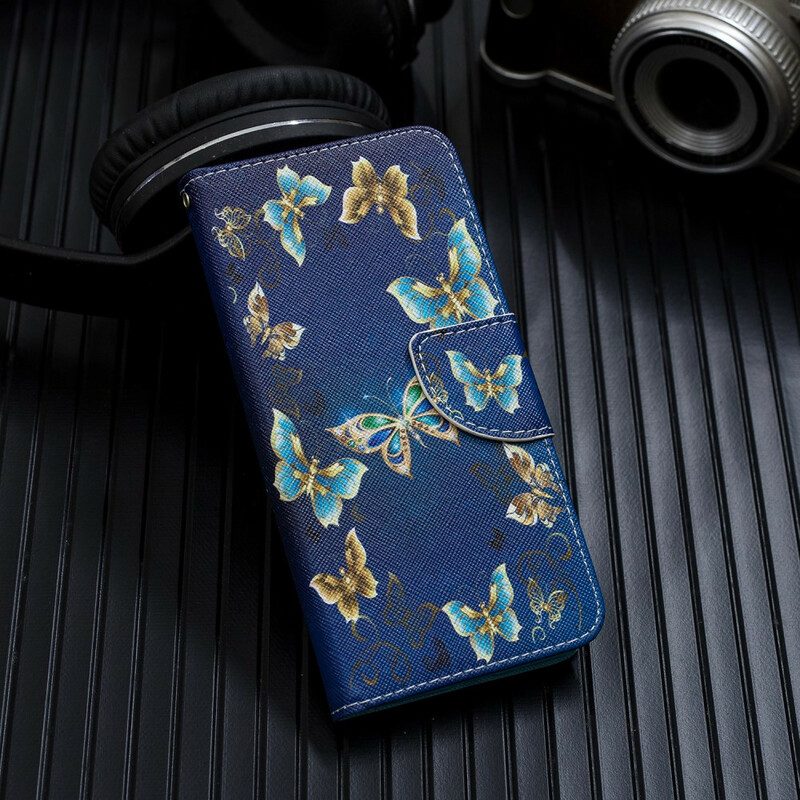 Custodia in pelle iPhone 12 Mini Farfalle Blu E Fiori Con Cinturino