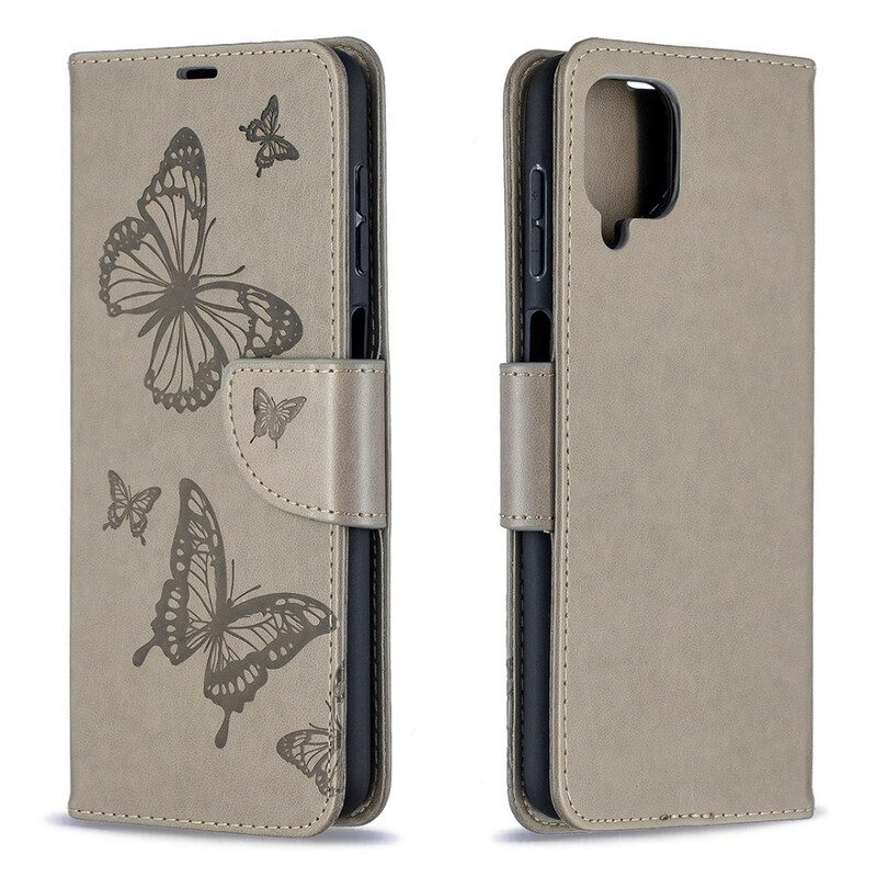 Custodia in pelle Samsung Galaxy M12 / A12 Farfalle In Volo Con Cordino