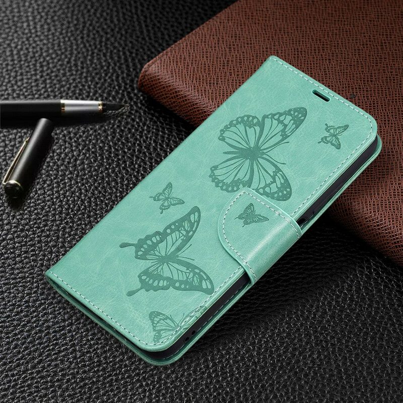 Custodia in pelle Xiaomi Redmi Note 10 5G Farfalle Stampate Strappy