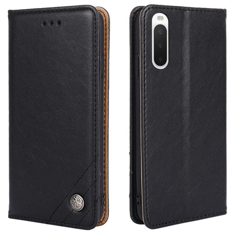 Folio Cover Sony Xperia 10 IV Custodia in pelle Rivetto Decorativo In Ecopelle