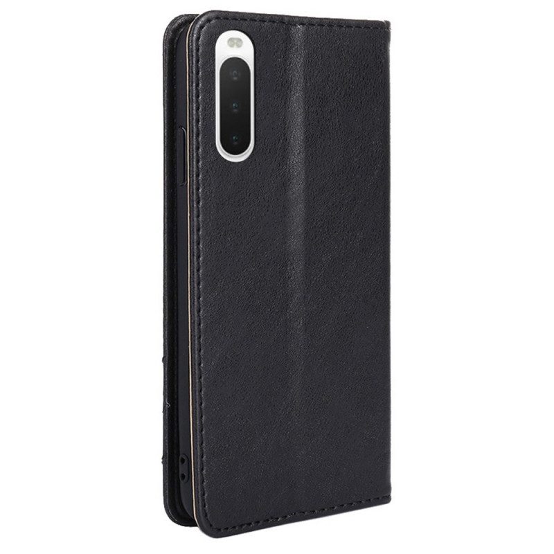 Folio Cover Sony Xperia 10 IV Custodia in pelle Rivetto Decorativo In Ecopelle