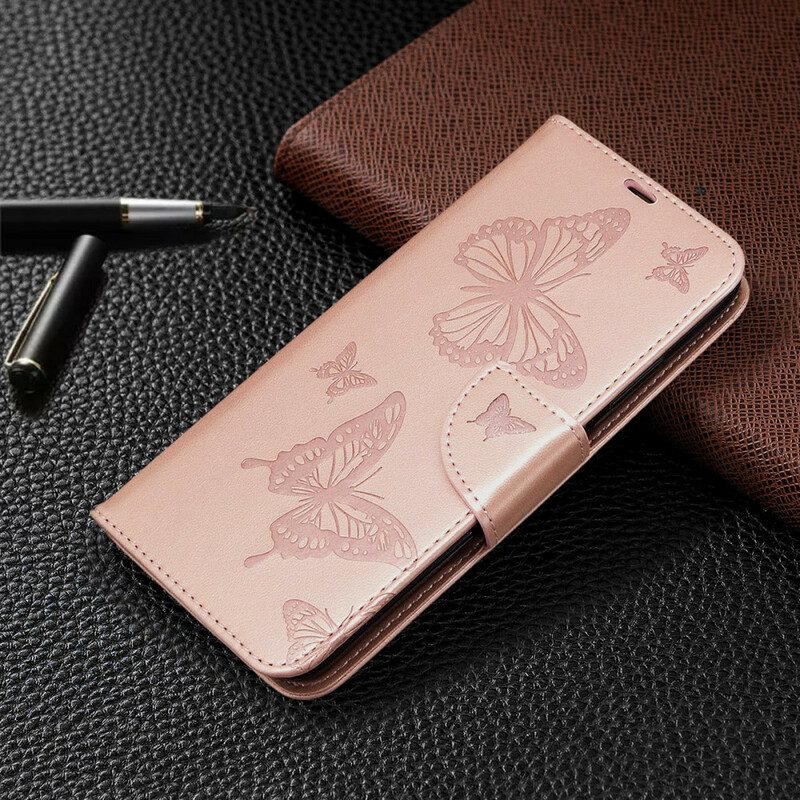 Custodia in pelle Huawei P40 Lite Farfalle Stampate Strappy